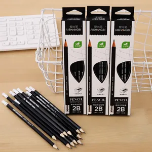 Close-up of 2B hexagonal graphite pencils and retail boxes in a study setting