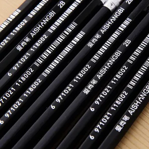 Close-up of professional black hexagonal 2B drawing pencils with barcodes and silver text
