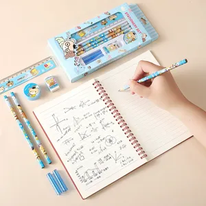 Cute children stationery set gift box with pencils, ruler, eraser and notebook for students.