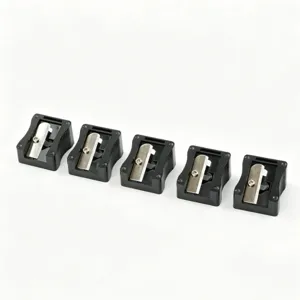 Detail view of five professional black 12mm large aperture sharpeners for eyebrow pencils