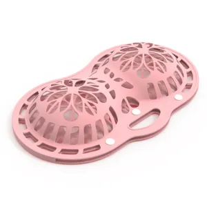 Detailed macro view of the hollow floral pattern on the pink silicone bra laundry bag