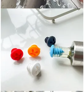 Close up of colorful silicone screw shaped wine bottle stoppers, food grade sealing cap detail.