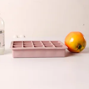 Detailed side view of a 15-grid pink silicone ice cube mold designed for large cubes