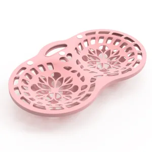 Pink silicone bra laundry bag with floral mesh pattern for machine wash protection