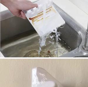 Plastic kitchen utensil rest and pot lid holder for countertop, easy to clean design.