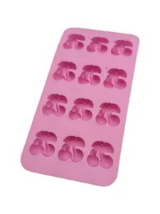 Detail showing the 12-cavity cherry shapes of this pink silicone baking and DIY mold