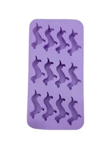 Detailed macro shot of a purple silicone mold with twelve dachshund dog shaped cavities