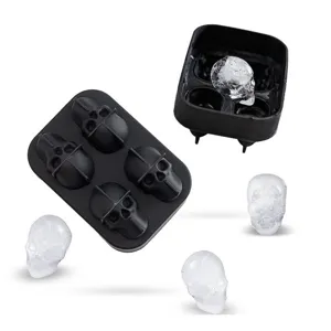 4-cavity black silicone skull ice mold with realistic clear skull ice cubes