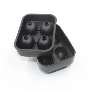 Detailed macro view showing the top and bottom of a black silicone skull ice cube mold