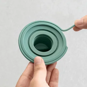 Copertura universale per scarico in silicone verde, tappo anti-odore tagliabile per il bagno