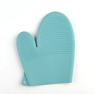 Heat resistant turquoise silicone oven mitt with anti-slip texture for kitchen and BBQ.