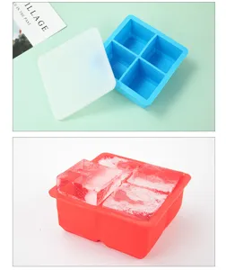 Macro view of a 4-cavity square silicone ice cube mold showing large ice cubes with lid