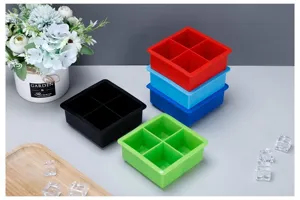 Stack of colorful 4-cavity square silicone ice cube trays for large ice blocks