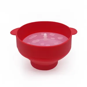 Collapsible silicone popcorn bowl with lid and handles, large red microwave popcorn maker for home.