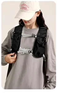 Detailed view of lightweight outdoor running vest with adjustable grey chest buckles