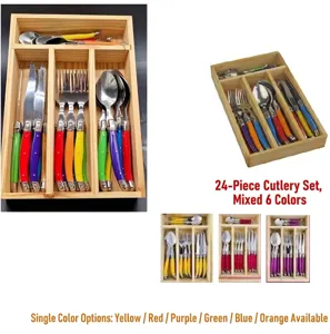 Detail view of 24-piece colorful cutlery set with knives and forks in wooden tray