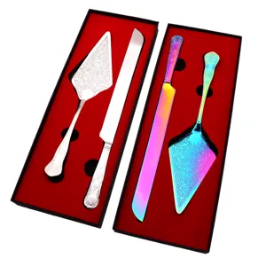 Stainless steel cake knife and server set in silver and rainbow finish in a gift box