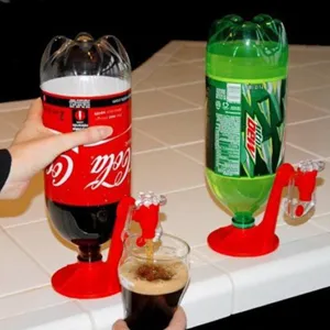 Detail of red plastic soda dispenser tap attached to inverted 2L carbonated drink bottle.