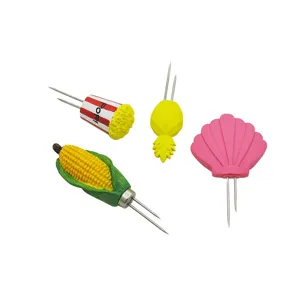 Set of 4 stainless steel corn forks with cartoon popcorn, pineapple and shell handles.