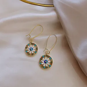 Vintage gold drop earrings with circular floral pendants and colorful crystals boho style