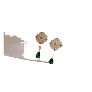 Elegant vintage gold floral lace earrings featuring dangling green teardrop gemstones