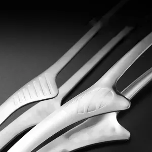 Detailed close-up showing the brushed stainless steel finish of Korean BBQ food tongs