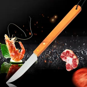 Macro detail of a sharp stainless steel BBQ meat knife with a natural wooden handle