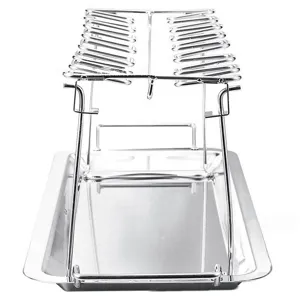 Close-up view of a professional foldable stainless steel chicken leg rack with drip tray