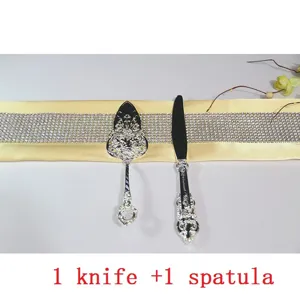 Ornate vintage silver-plated royal cake server and knife set with floral engravings
