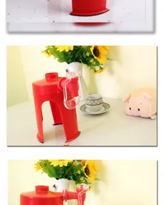 Red plastic inverted beverage dispenser with clear tap for soda and soft drinks