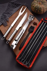 Stainless steel BBQ tool set including knife, fork, tongs, and skewers in a storage bag