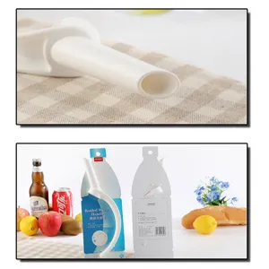 Macro view and packaging of white plastic portable bottled water handle and beverage carrier