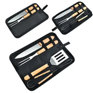 Professional stainless steel BBQ tool set with wooden handles in a black storage bag