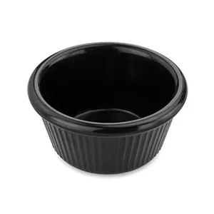 Detailed view of black ribbed dipping sauce bowl with a glossy finish for restaurant use