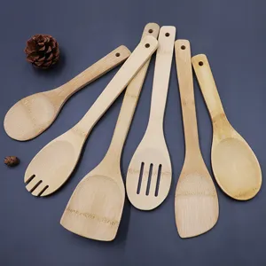 Close-up of 6-piece natural bamboo kitchen utensil set with hanging holes for non-stick pans.