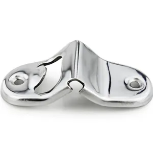 Macro detail showing the polished stainless steel surface of the wall bottle opener.
