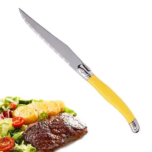 Stainless steel steak knife with yellow plastic handle, sharp serrated blade for kitchen dining.