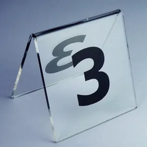 Professional clear V-shaped acrylic table number 3 sign for restaurant seating and events