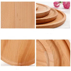 Detalle de cerca de la veta de madera de haya natural y bordes lisos en bandejas redondas