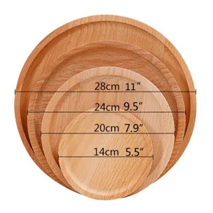 Vista detallada de cuatro bandejas redondas de madera de haya con diámetros indicados.