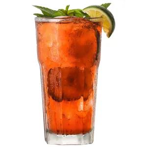 Close-up detail of a transparent octagonal acrylic cup filled with iced tea and fresh lime