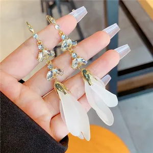 Elegant long gold earrings with zircon wheat ears and translucent white petals.