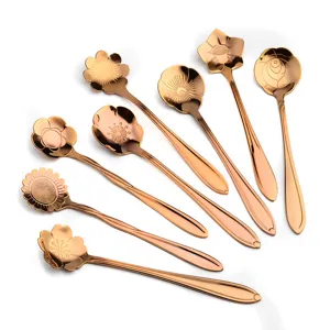 Close-up details of rose gold flower spoons set, exquisite petal design for coffee and dessert.