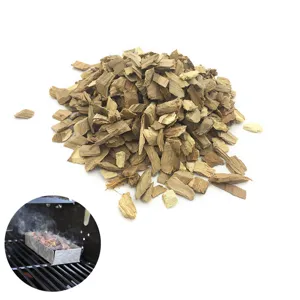 Natural wood chips for BBQ smoking with inset showing wood smoker box in use on a grill