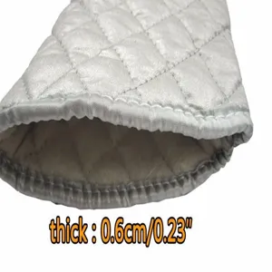 Macro detail of silver heat resistant oven glove showing 0.6cm quilted thickness