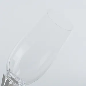 Crystal glass champagne flute detail view, transparent wine goblet close up showcase.