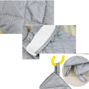 Close-up details of gray quilted oven mitts showing texture, lining, and hanging loop