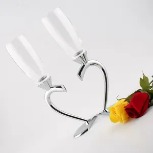 Elegant heart shaped crystal champagne flute set for wedding party and romantic dinner