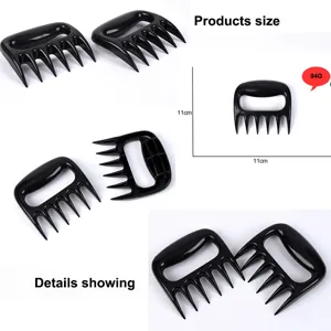 Detailed view of black bear claw meat shredders for BBQ with 11cm dimension markings