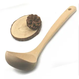Natural wooden soup ladle with an ergonomic curved handle for eco-friendly dining